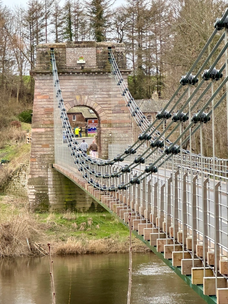 The western side of the bridge, showing the Scottish Tower and the distinct chain links.
